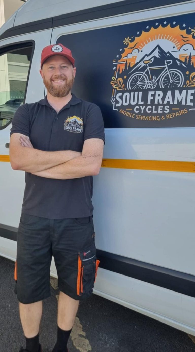 Roger Prestidge Mobile Cycle Mechanic Friendly mobile mechanic standing beside a mobile workshop van with "Soul Frame Cycles" logo.